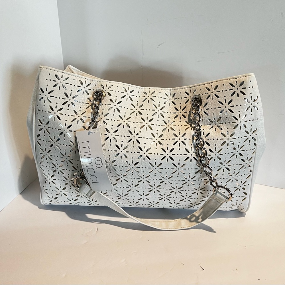 White purse Minicci with silver chain. New with tags